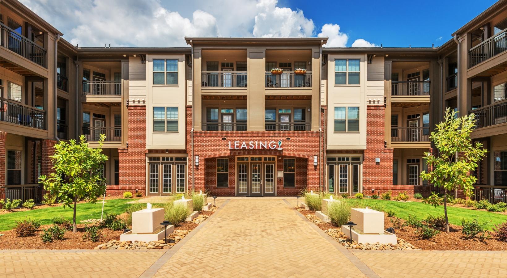 Find your perfect fit at Fountains Matthews Apartments a building with a courtyard