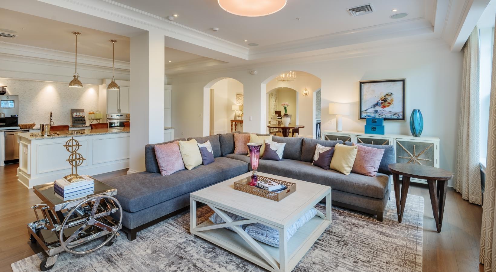 Take advantage of all Fountains Matthews Apartments has to offer a living room with a couch and coffee table