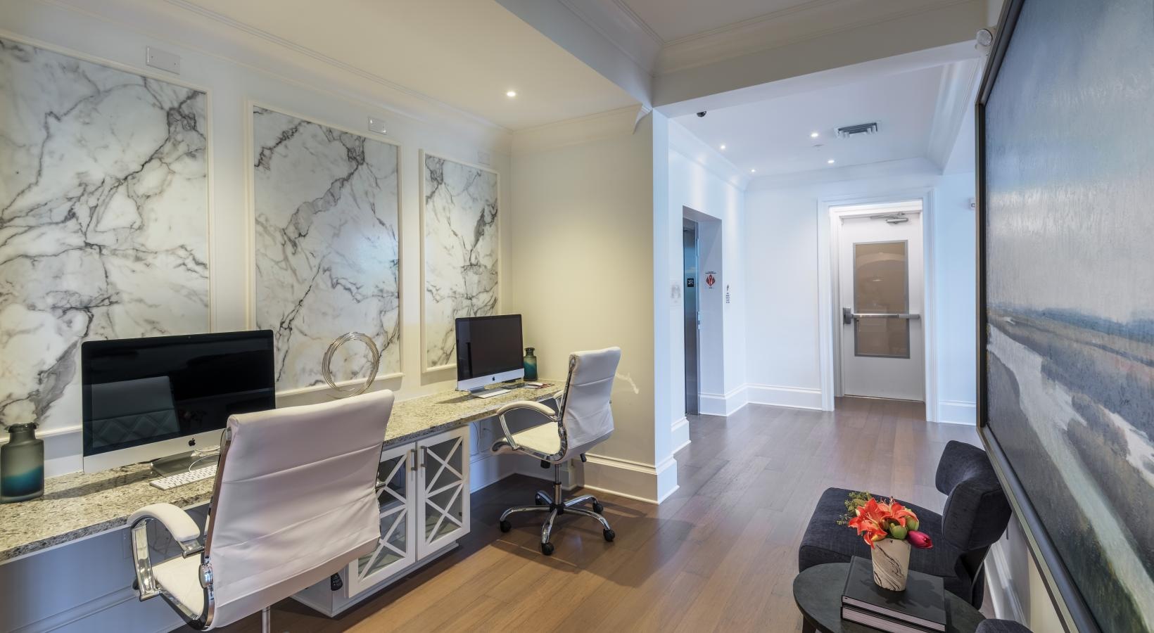 Access to resident-only features a room with a tv and chairs
