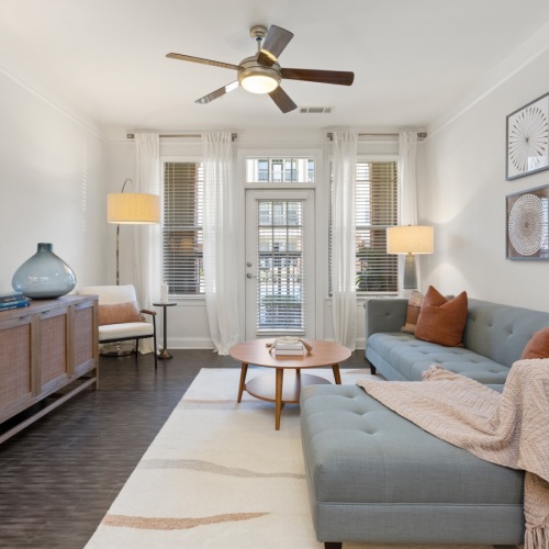 living room with access to private porch