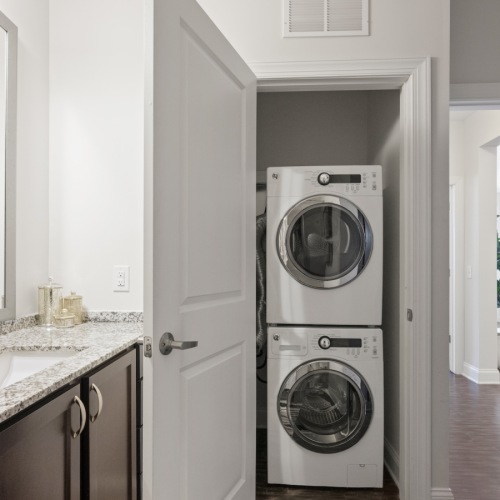 a laundry area near a bathroom