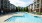 lounge chairs surrounding pool