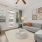 large windows brighten spacious living room