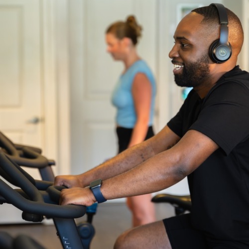 a man on a stationary bike