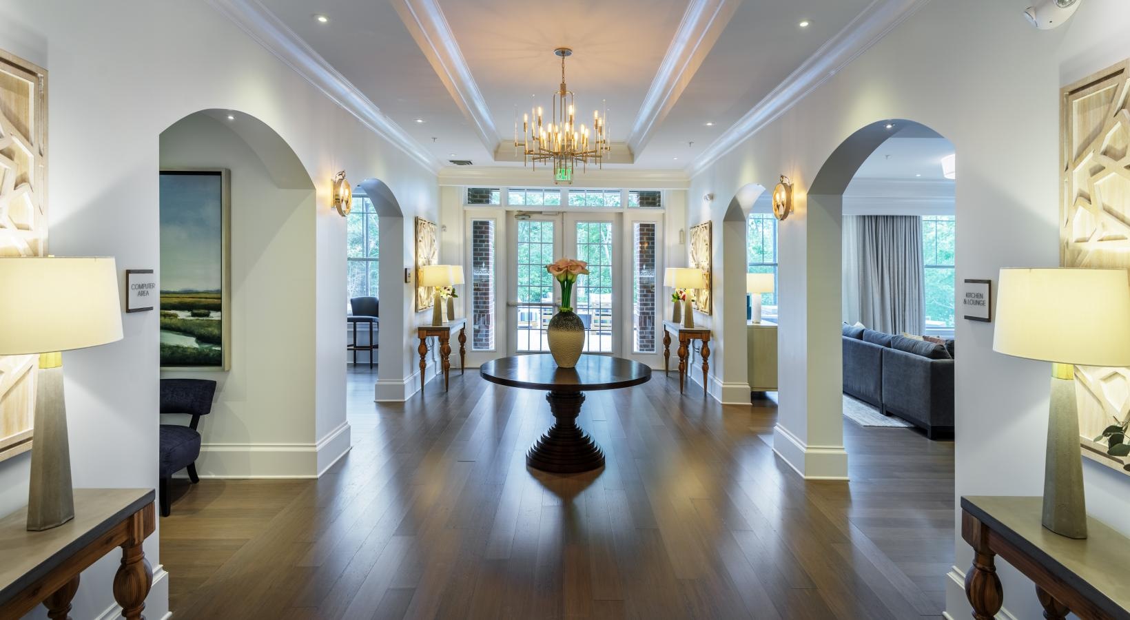 Access to resident-only features a large room with a wood floor